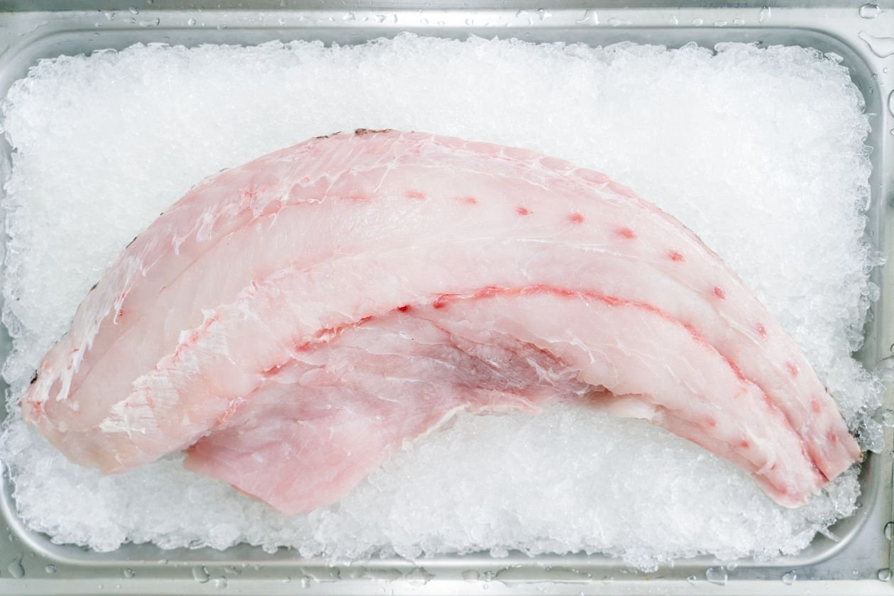 Golden crusted cod fillets with lemon and herbs, fresh from the air fryer.