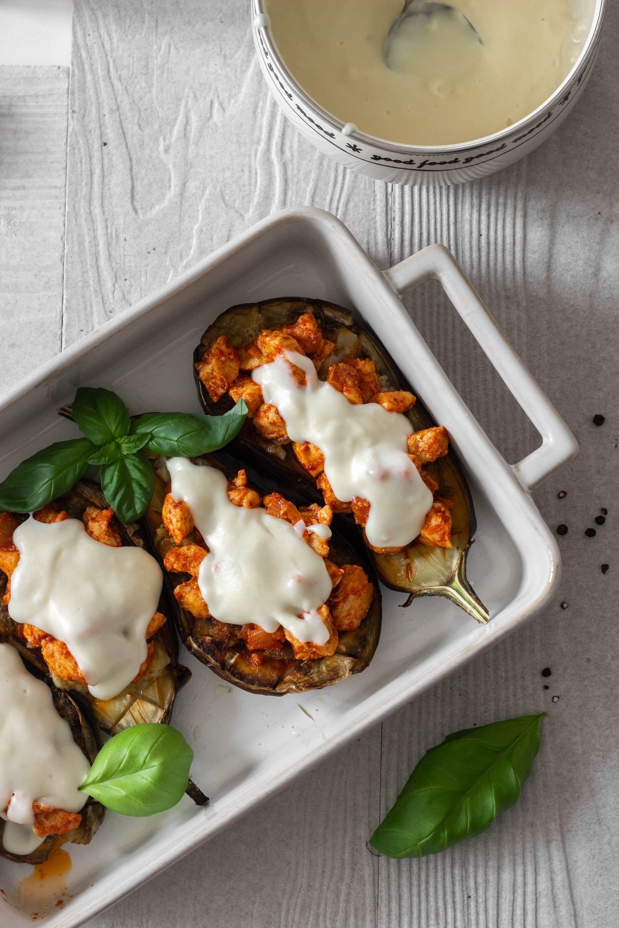 Golden breaded eggplant slices with melted cheese and herbs.