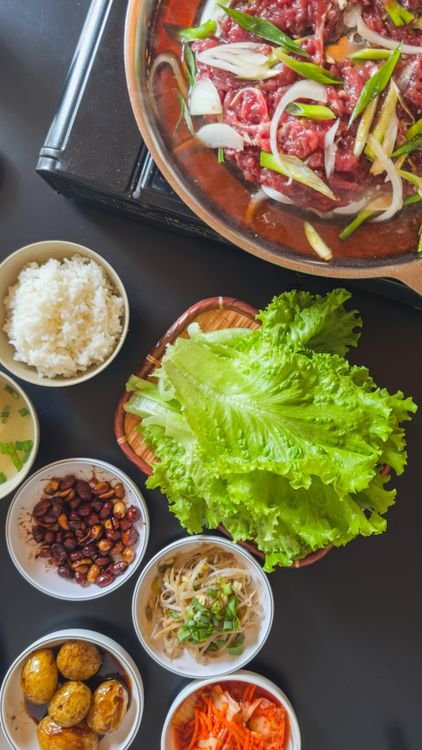 Asian lettuce wraps filled with savory chicken filling and crunchy toppings.
