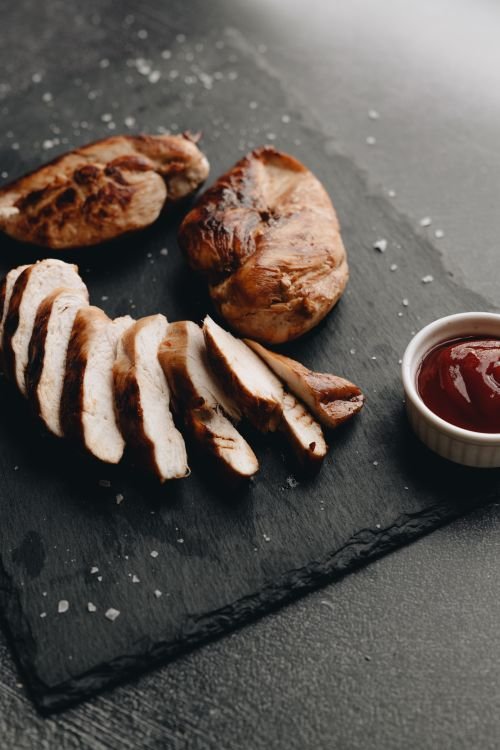 Roasted chicken breasts with a golden honey mustard glaze.